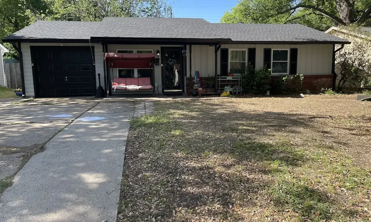 Hail Damage Roof Repair crew at work on a residential roof in Olivette